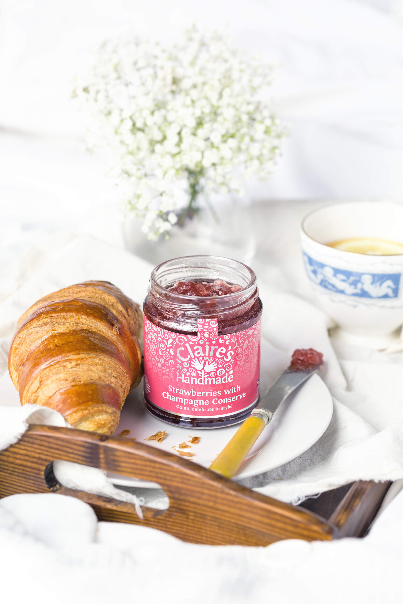 Claire Handmade Strawberries & Champagne Conserve with a freshly baked croissant