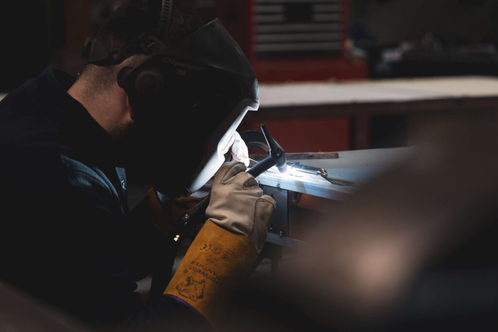 Clark door employee making a door