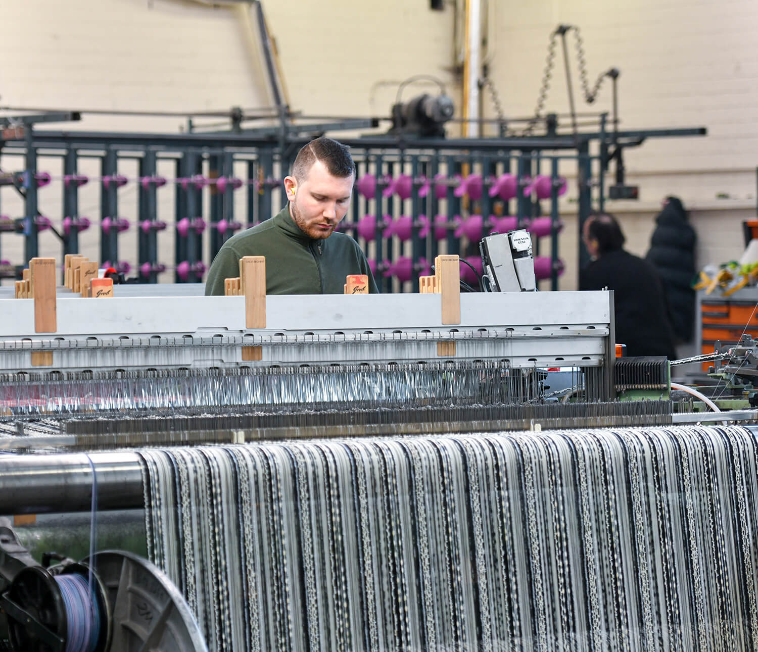 Man working at the Linton Tweed factory in Carlisle