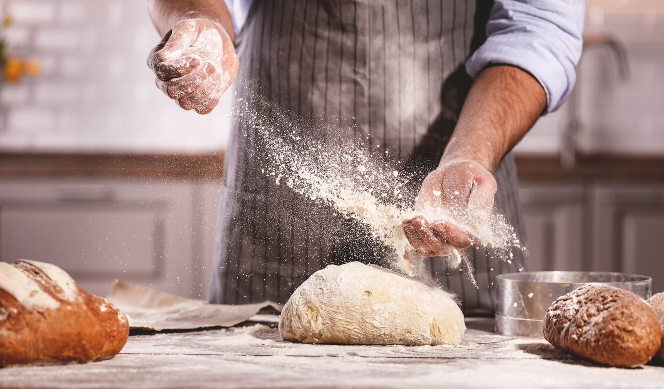 Person making homemade bread in Cumbria